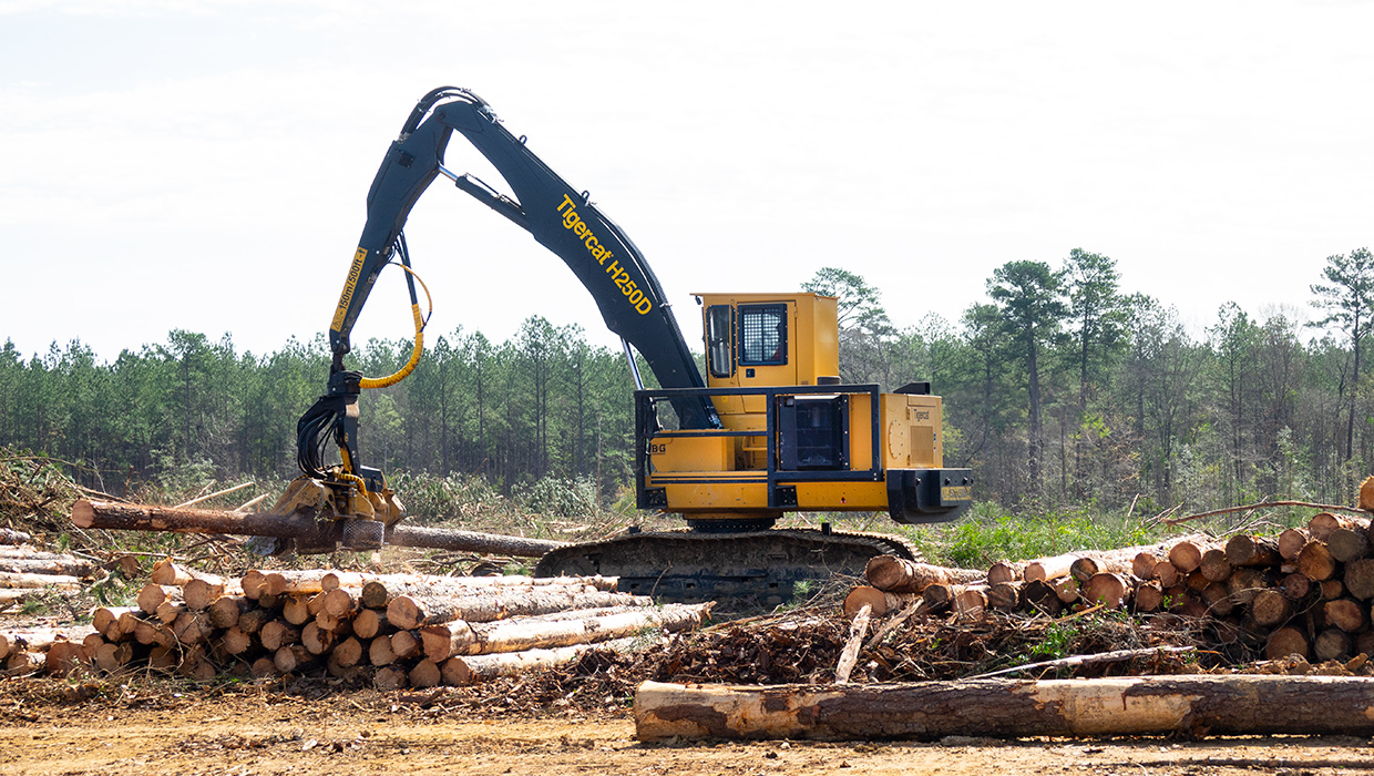 Image of a Tigercat H250D processor working in the field.