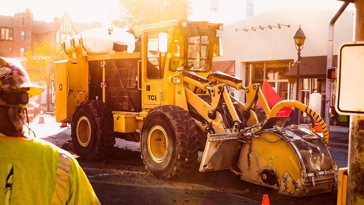 A TCi 730 street trencher working in the field.