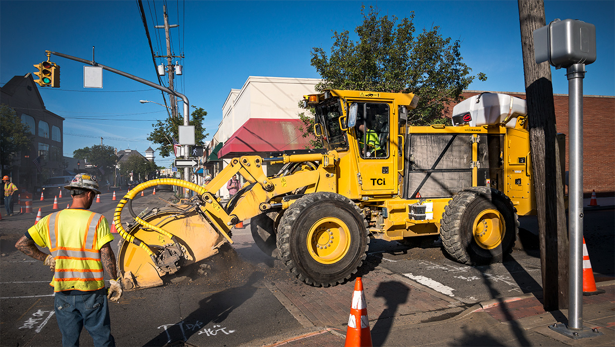 A TCi 730 street trencher working in the field.