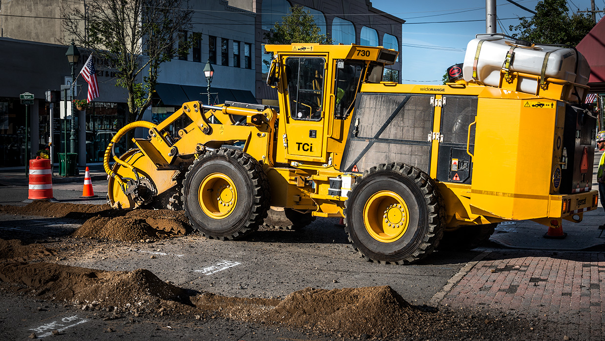 A TCi 730 street trencher working in the field.