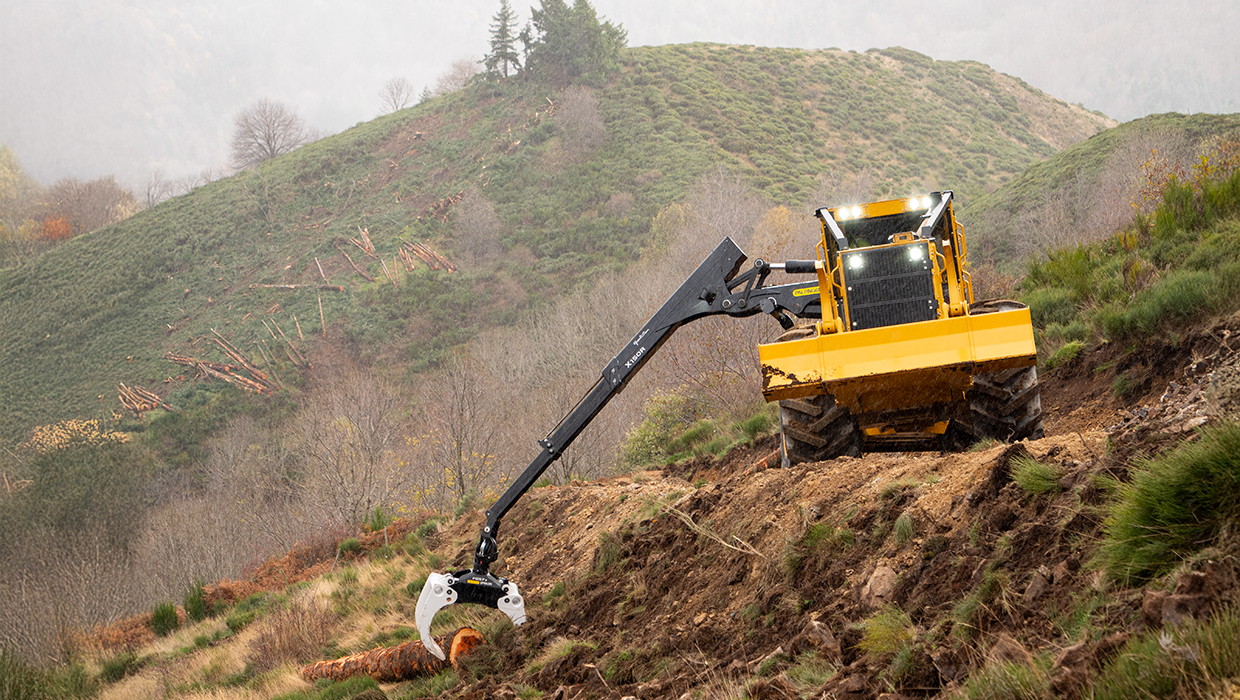 Image of a Tigercat 612 dual winch skidder working in the field