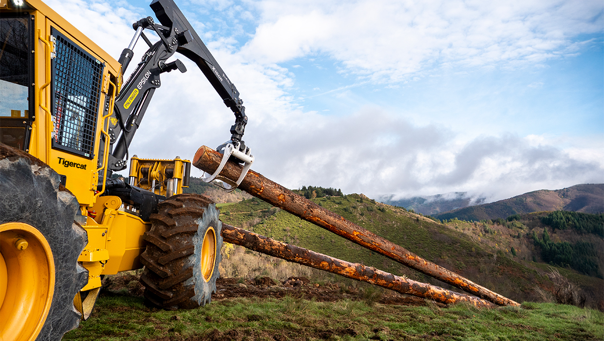 Image of a Tigercat 612 dual winch skidder working in the field