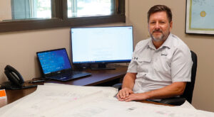 Jon Cooper at desk