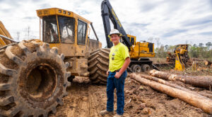 Levin Spring standing amongst Tigercat machines.