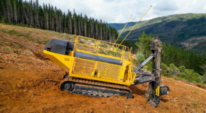 Image of a Tigercat 120 winch assist working in the field